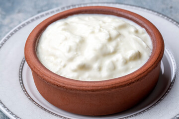 Homemade yogurt in a rustic bowl