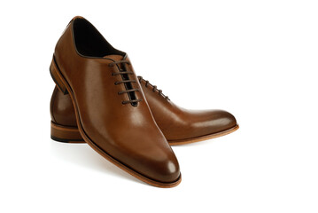 Men's brown oxford fashion shoes isolated on a white background.