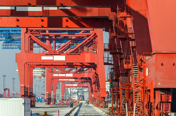 Closeup shot of gantry cranes at a container terminal in the harbour in Hamburg, Germany