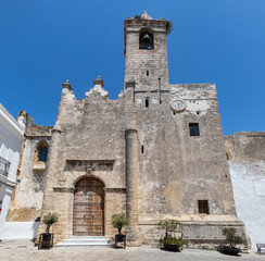 Fototapeta na wymiar The church of Divino Salvador de Vejer de la Frontera, Cadiz, Spain, is a church located in the highest part of this town, within its old walled enclosure, declared a historical-artistic complex.