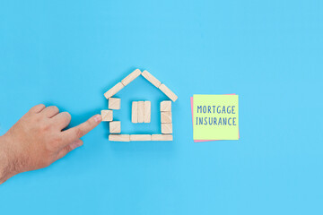 Fototapeta na wymiar Handwritten words Mortgage insurance