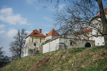 View of a white castle with tiles. Cultural heritage historic building. White castle under UNESCO...