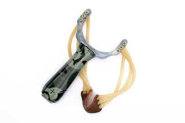 Steel, sport fishing slingshot with triple harness. Hunting slingshot on a white background. Slingshot made of metal with elastic bands.