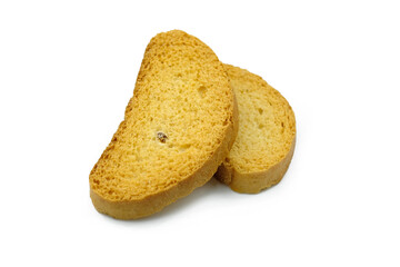 Two sweet croutons with raisins on a white plate. Loaf crackers. Sweet Dry crackers, close-up