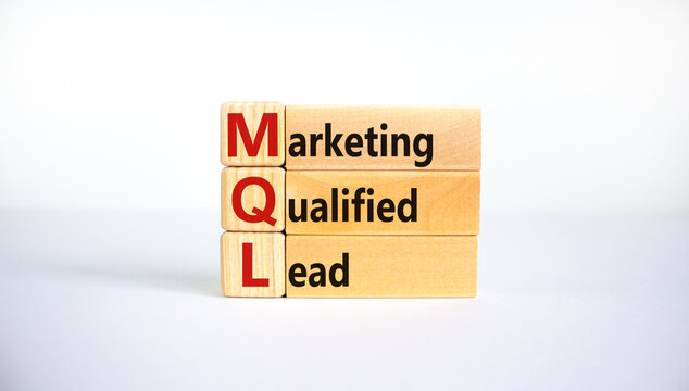 MQL marketing qualified lead symbol. Wooden blocks with words 'MQL marketing qualified lead'. Beautiful white background. Business and MQL marketing qualified lead concept. Copy space.
