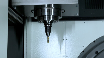 CNC metal processing. Automated metalworking machine.