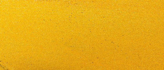 Gold glitter abstract background. Golden textured surface. Minimalism