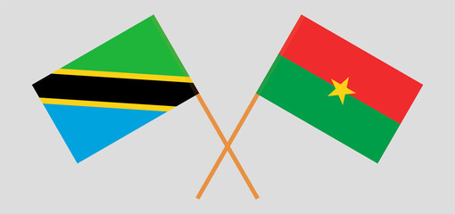 Crossed flags of Tanzania and Burkina Faso. Official colors. Correct proportion