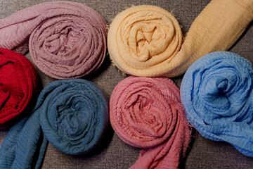 Obraz na płótnie Canvas Silk scarf muslim. Multi-colored plain scarves.