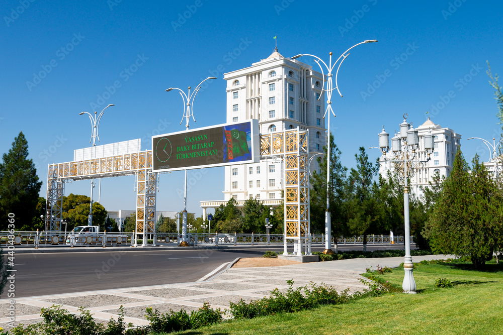 Wall mural overhead road sign and lamp posts ornamented at ashgabat, turkmenistan. gold decoration in upscale a - Wall murals