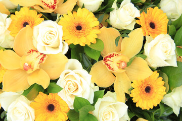 Cymbidium orchids, Gerberas and roses