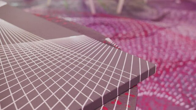 A painter is creating a picture 