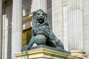 Parliament facade columns and lion in Madrid, Spain. Congreso diputados