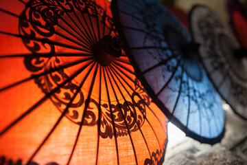 Traditional Myanmar Umbrellas on the night market in Bagan. © Marcin Kilarski/Wirestock