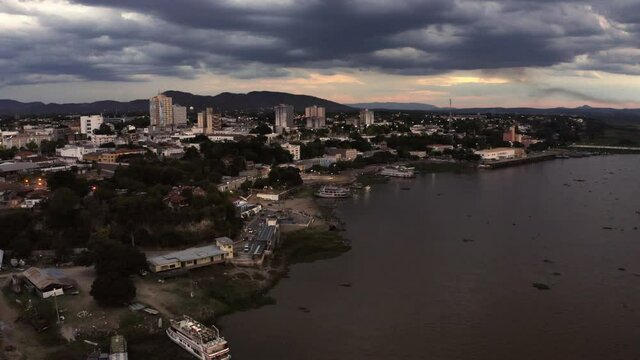 Corumba, Brazil at twilight along the Rio Paraguay River - aerial parallax view