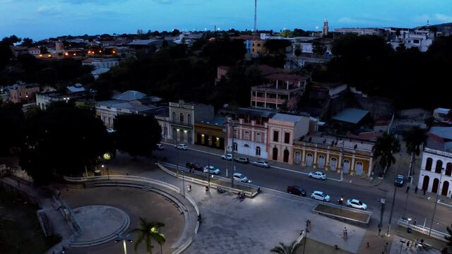 Historic and beautiful city of Corumba, Brazil at twilight - tilt down, aerial view
