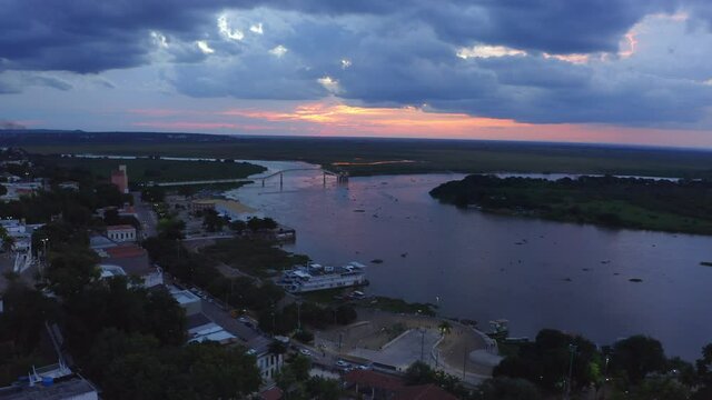 The Rio Paraguay river in Corumba, Brazil at sunset - aerial view of the colorful landscape