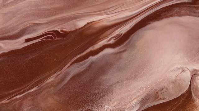 Fluid art painting video, modern acryl texture with flowing effect. Mocha mousse color of the year 2025. Detailed background motion with brown, beige and chocolate overflowing colors.