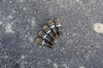 View of Five Car wheel bolts.