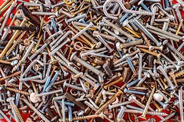 Detail of a pile of screws viewed from above for repairs.