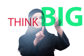 Think big concept with businesswoman