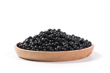 raw black soya bean in a bowl isolated on white background.