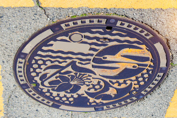   Close up  old and rusty manhole on the street top view