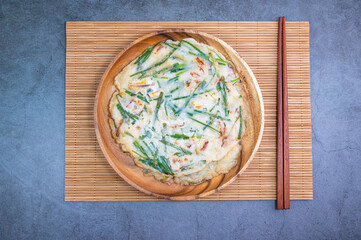 Fototapeta na wymiar Korean Seafood and Chive Pancake, 'Haemulbuchujeon'