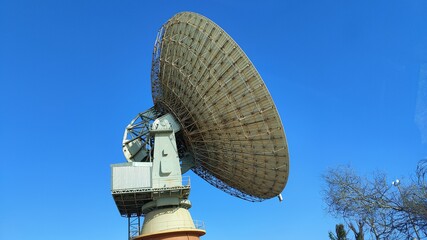 A large OTC radio antenna/dish, no longer in use, previously part of the space programme from the 60s and 70s including the US moon landing. 