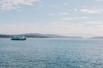 ferry boat on the Puget Sound on a sunny day with few clouds