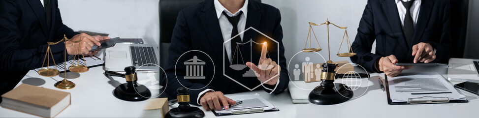 Concepts of Law and Legal services. Lawyer working with law interface icons. Blurred background.	
