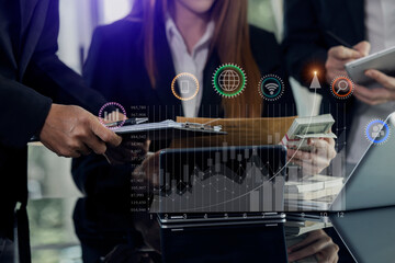 Businessman hands working on network and digital finance marketing chart with future technology innovation and digital transformation concept.
