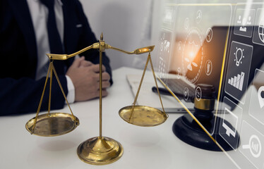 Concepts of Law and Legal services. Lawyer working with law interface icons. Blurred background.	
