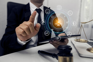 Concepts of Law and Legal services. Lawyer working with law interface icons. Blurred background.	