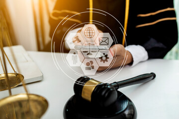 Concepts of Law and Legal services. Lawyer working with law interface icons. Blurred background.