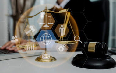 Fototapeta na wymiar Concepts of Law and Legal services. Lawyer working with law interface icons. Blurred background.