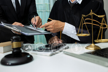 Concepts of Law and Legal services. Lawyer working with law interface icons. Blurred background.	