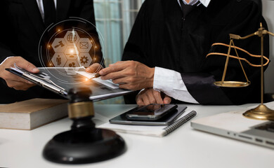 Concepts of Law and Legal services. Lawyer working with law interface icons. Blurred background.	