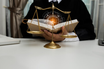Concepts of Law and Legal services. Lawyer working with law interface icons. Blurred background.	