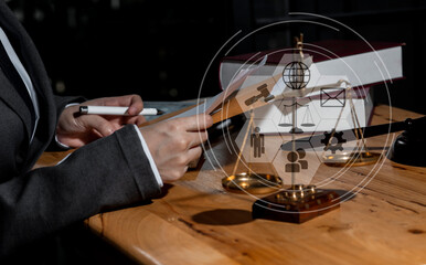 Concepts of Law and Legal services. Lawyer working with law interface icons. Blurred background.	