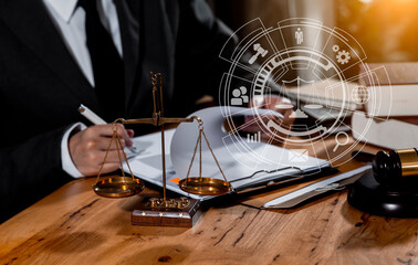 Fototapeta na wymiar Concepts of Law and Legal services. Lawyer working with law interface icons. Blurred background. 
