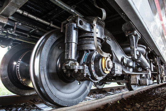 Close-up on a Train Car Undercarriage, passenger train, freight train