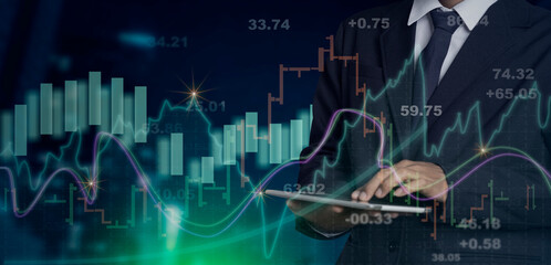 Double exposure of business hands working on digital tablet with business candle stick graph chart of stock market investment trading, Abstract icon, Business strategy concept.