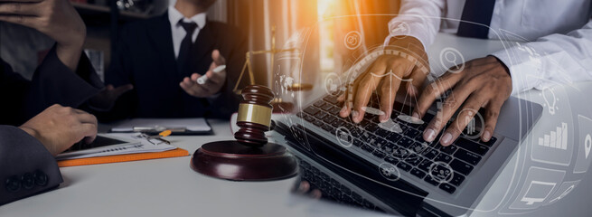 Concepts of Law and Legal services. Lawyer working with law interface icons. Blurred background.	