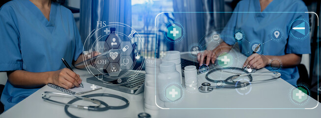Fototapeta premium Medicine doctor touching on digital tablet and hologram modern virtual screen interface icons, Medical technology and futuristic concept.