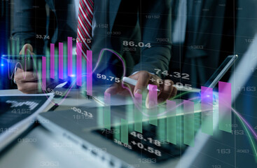 Businessman hands working on network and digital finance marketing chart with future technology innovation and digital transformation concept.
