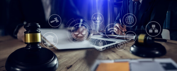 Concepts of Law and Legal services. Lawyer working with law interface icons. Blurred background.	