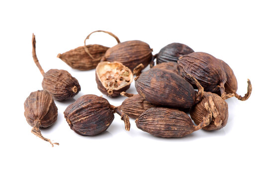 Black cardamom on a white background 