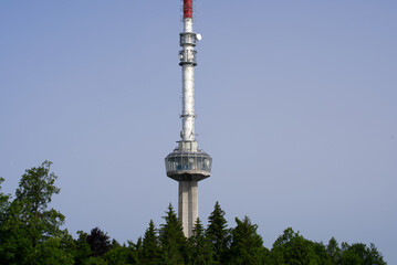 Radio tower at local mountain Uetliberg on a sunny summer day. Photo taken June 18th, 2021, Zurich, Switzerland.