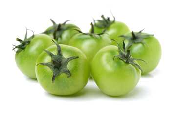 Green tomatoes on white background